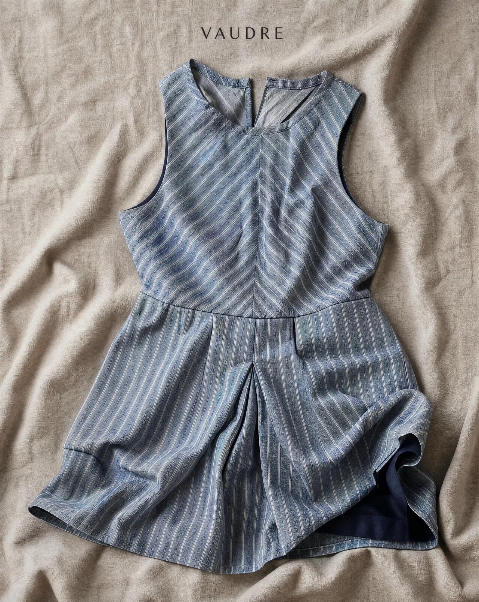 Chambray Blue Chevron-Stripe Cross-Back Mini Dress — Chambray Blue Dusty Denim Blue with Iv — the linen edit — VAUDRE numbered luxury — view 6
