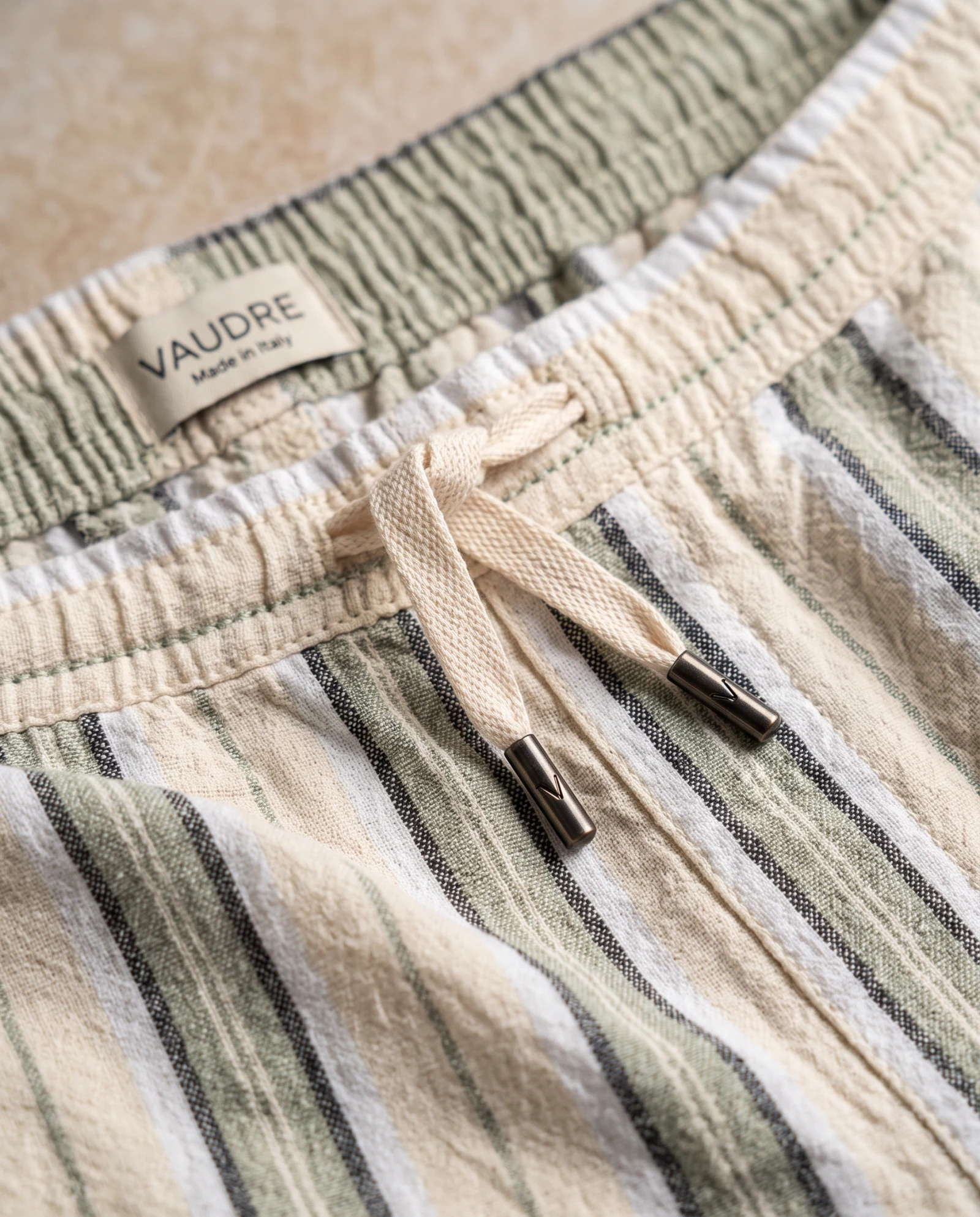 The Riviera Vintage Stripe Linen Resort Shorts — Sage Green Cream & Wheat Vintage Multis — the linen — VAUDRE numbered luxury — view 5