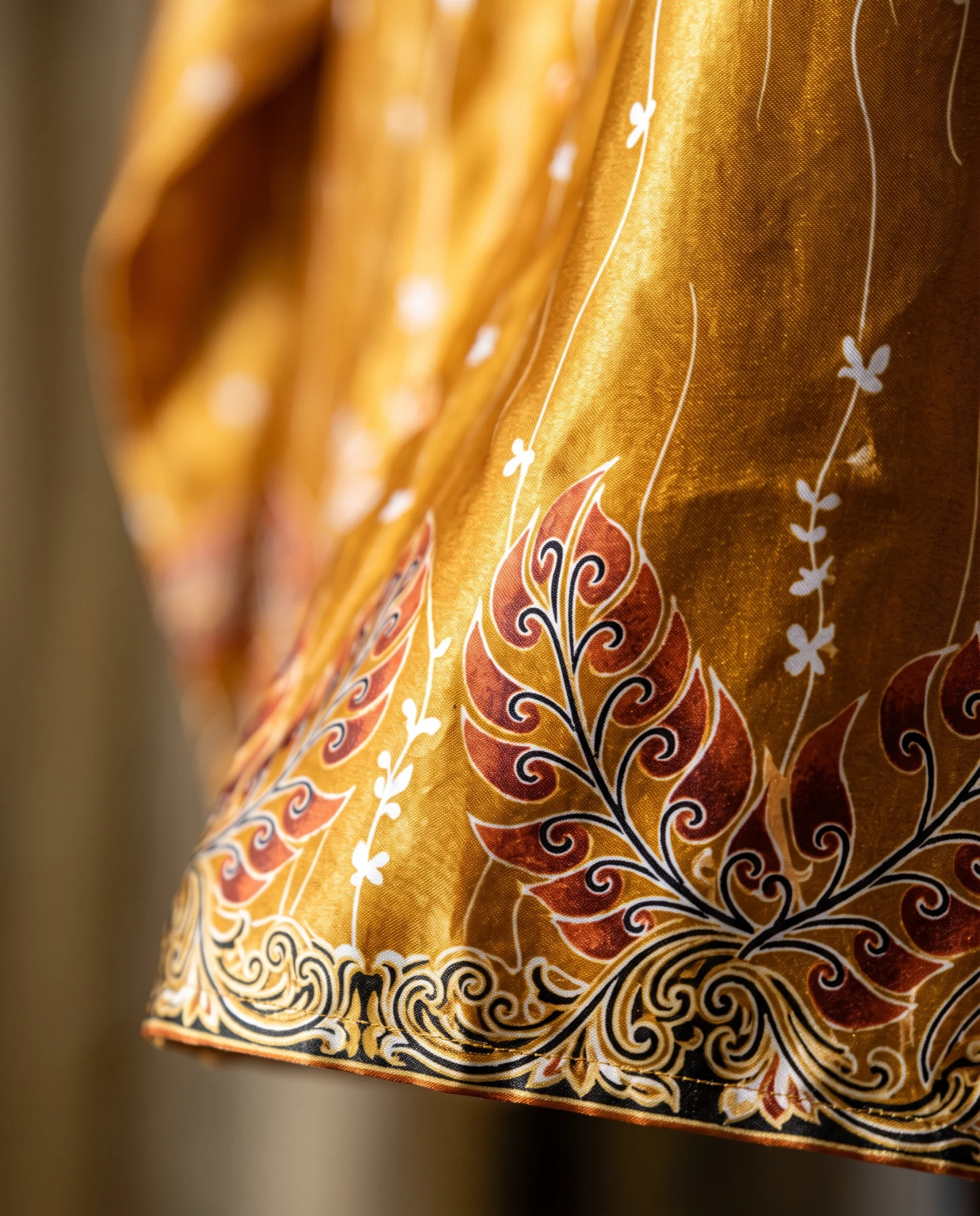 The Golden Fern Silk Batik Long-Sleeve Shirt — Molten Gold Amber & Ivory Fern Batik — the printed t-shirts & shirts — VAUDRE numbered luxury — view 5