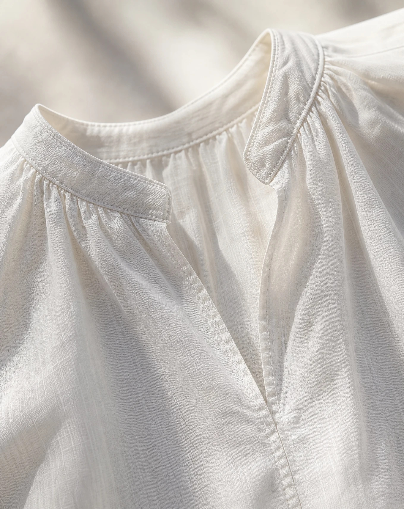 The Ivory Linen Band-Collar Sleeveless Top — Soft Ivory White — the blouses — VAUDRE numbered luxury — view 5