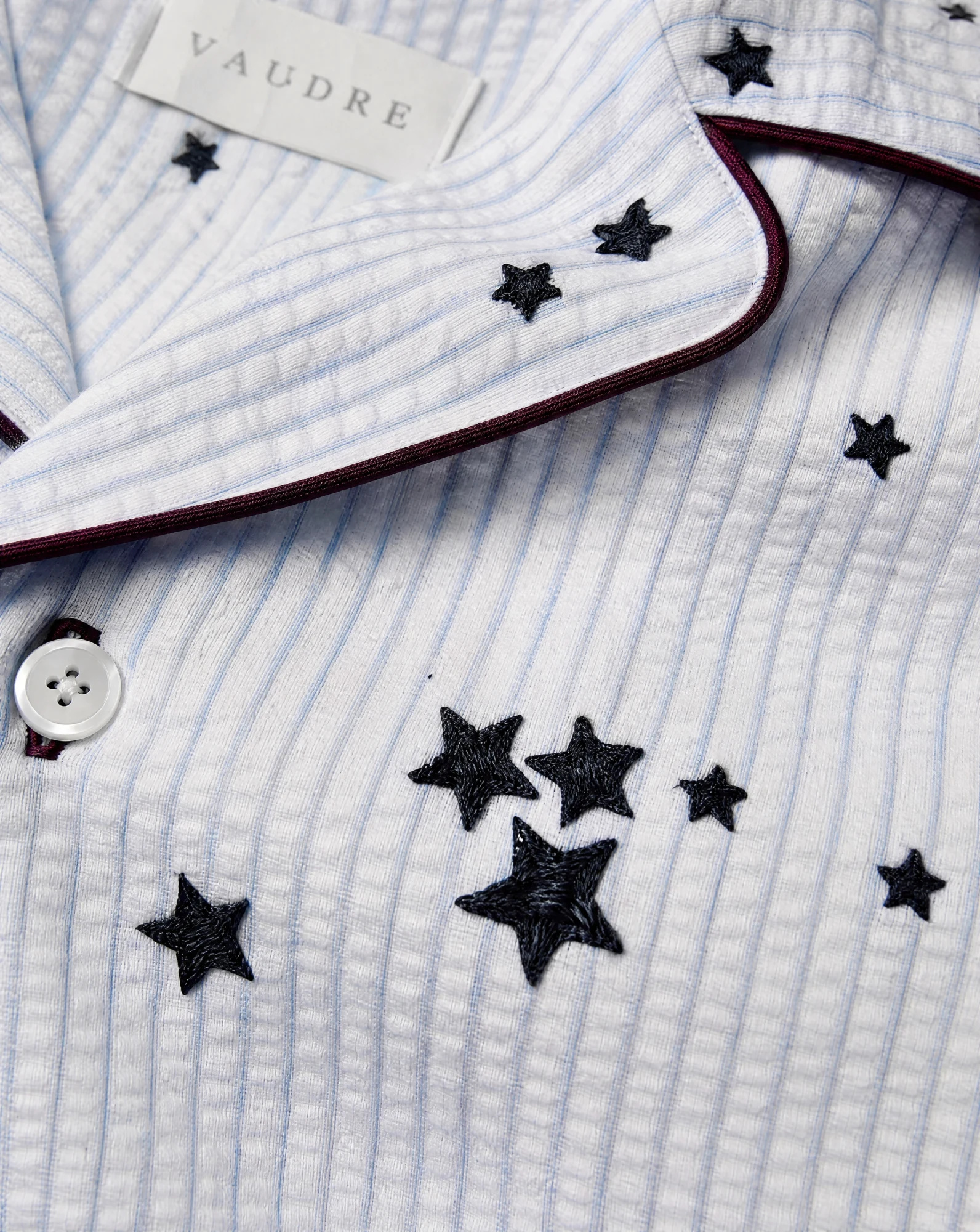 The Burgundy-Piped Star Sleep Shirt — White Pinstripe with Navy Stars — beach wear — VAUDRE numbered luxury — view 5