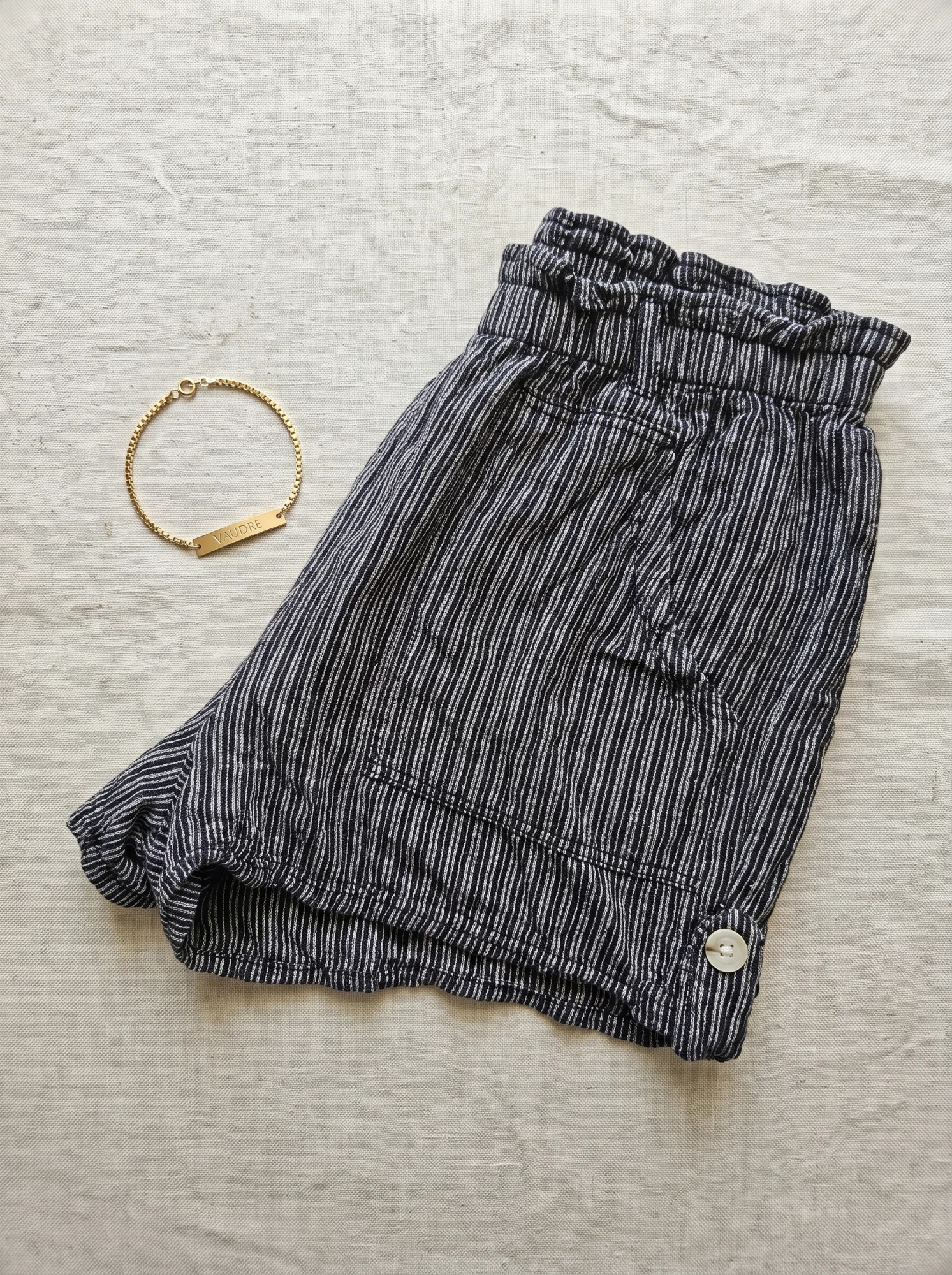 The Charcoal Pinstripe Paperbag Shorts — Charcoal Salt-and-Pepper Pinstripe — the linen edit — VAUDRE numbered luxury — view 3