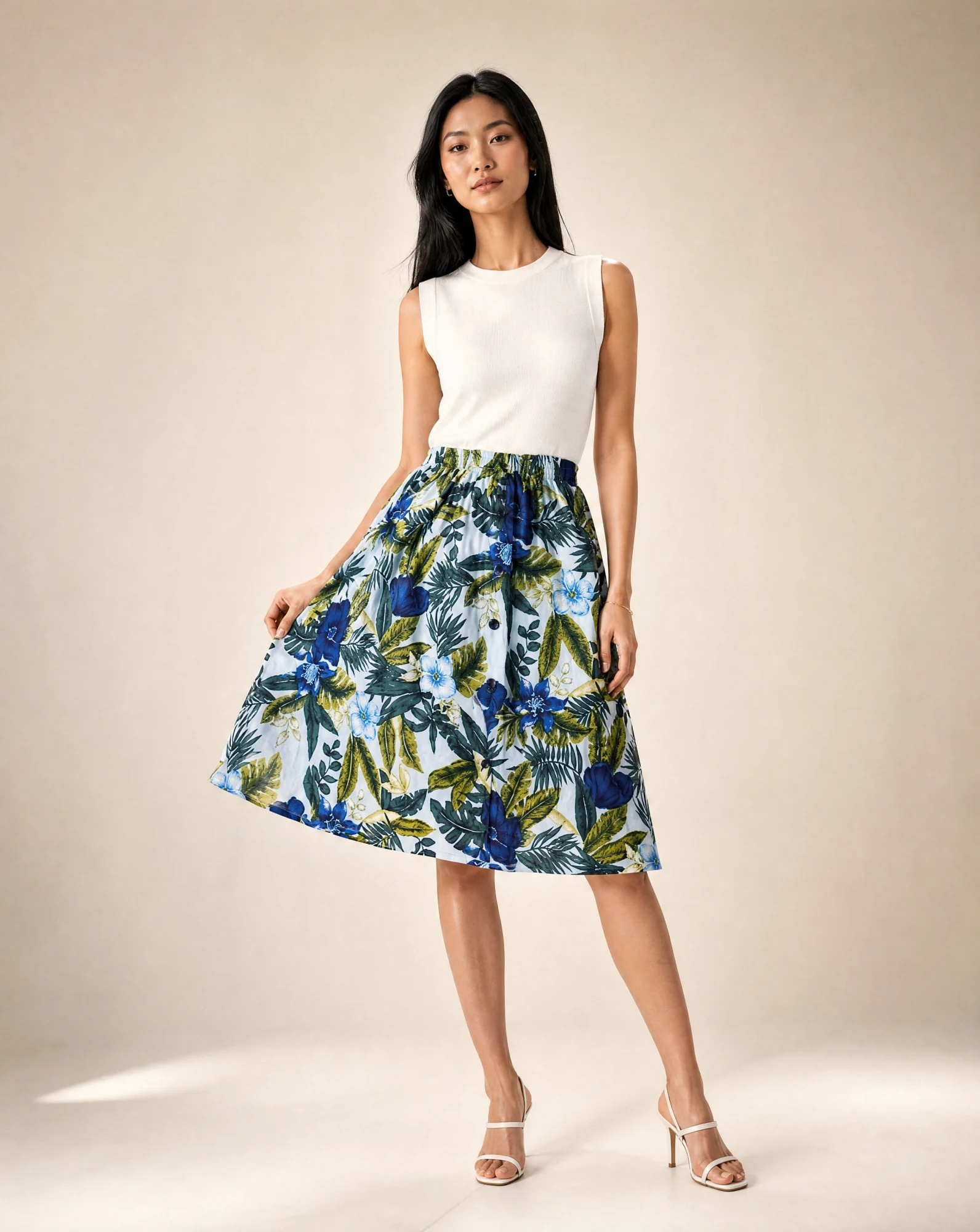 The Tropical Bloom Button-Front Midi Skirt — Ivory with Blue & Green Tropical Floral — the skirts — VAUDRE numbered luxury — view 2