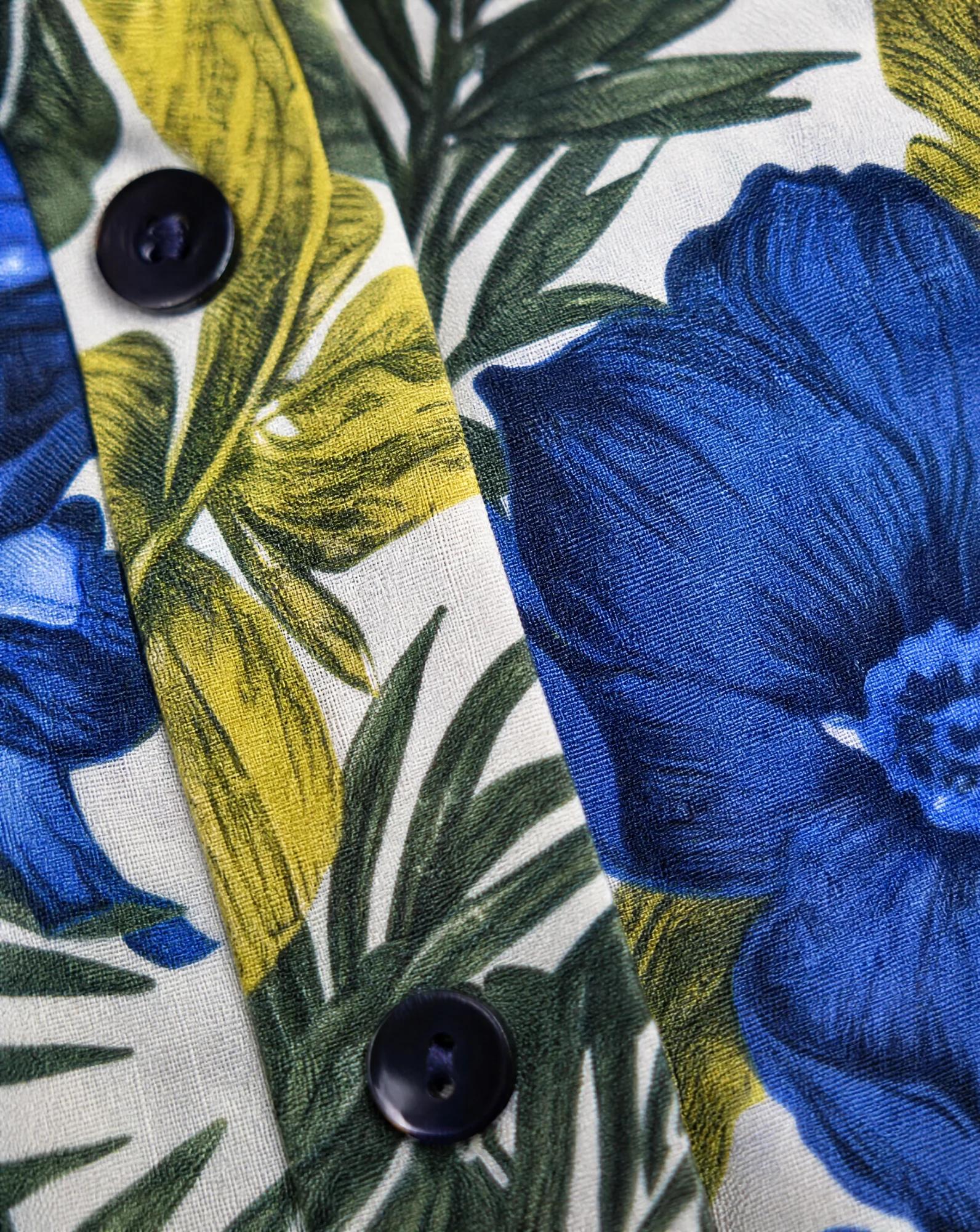 The Tropical Bloom Button-Front Midi Skirt — Ivory with Blue & Green Tropical Floral — the skirts — VAUDRE numbered luxury — view 5