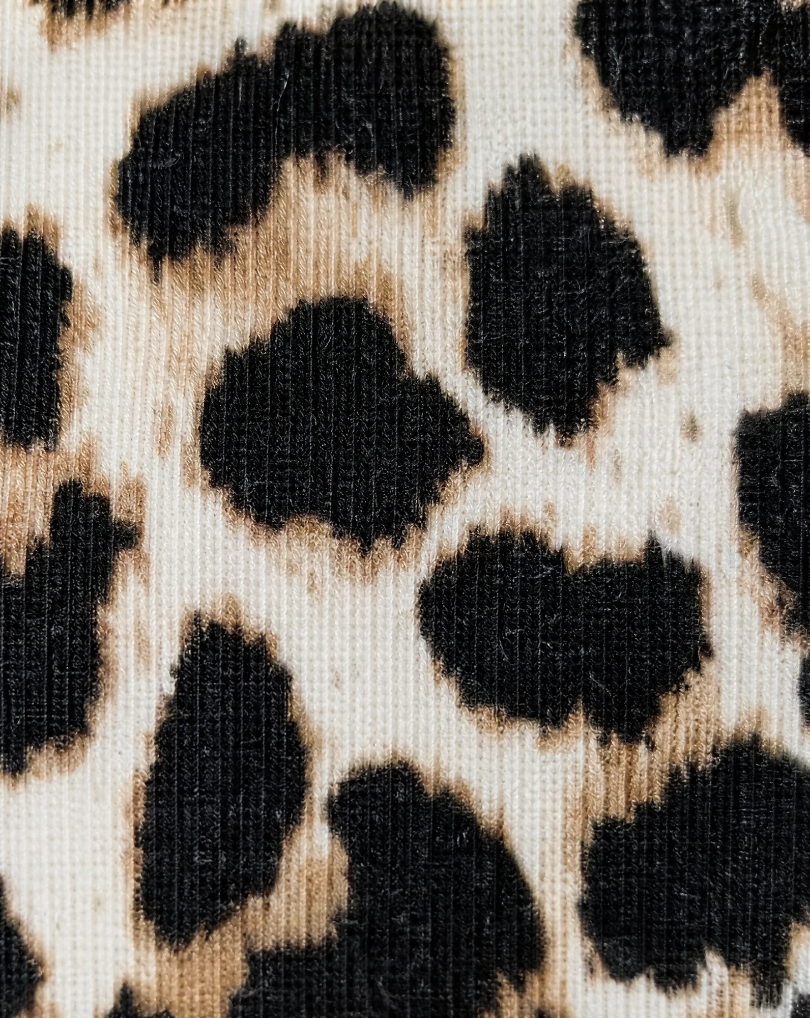 The Wild Leopard Cropped Tapered Trousers — Camel & Black Leopard Print — sovereign pants — VAUDRE numbered luxury — view 5