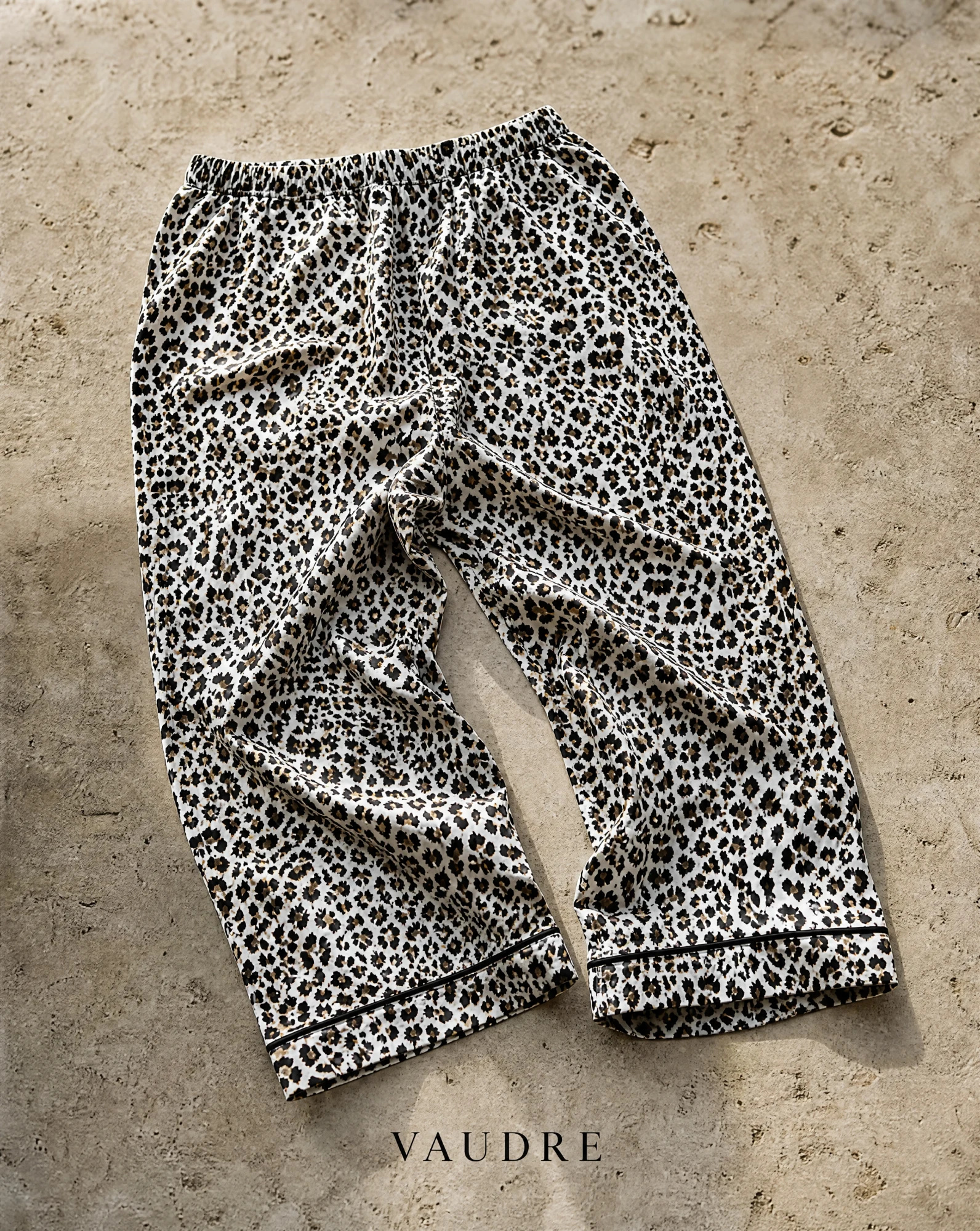 The Wild Leopard Cropped Tapered Trousers — Camel & Black Leopard Print — sovereign pants — VAUDRE numbered luxury — view 4